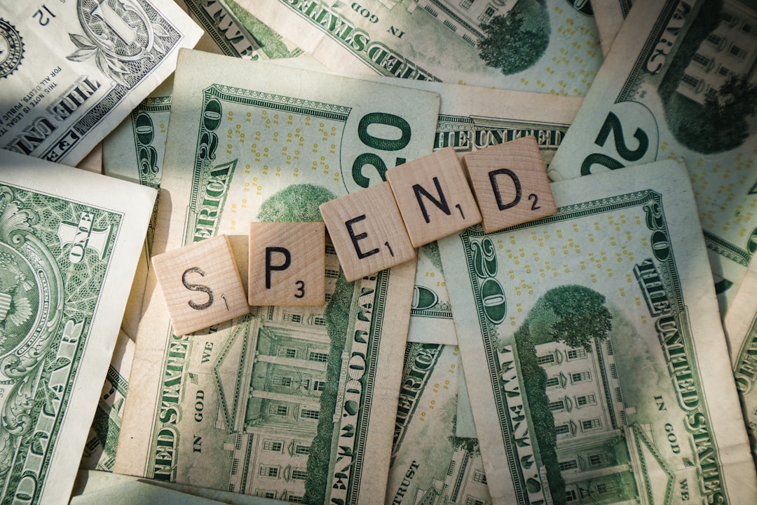 about-02 Scrabble letters spelling spend on American bills